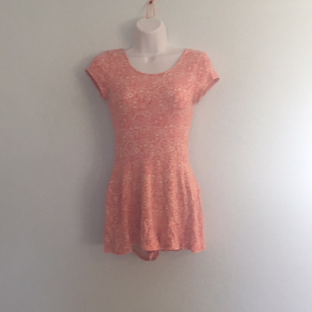 Pink and white patterned romper